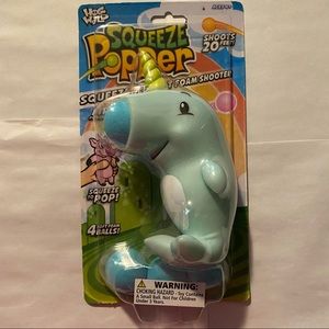 Hog Wild Squeeze Popper Narwhal Action Figure + 4 Soft Balls